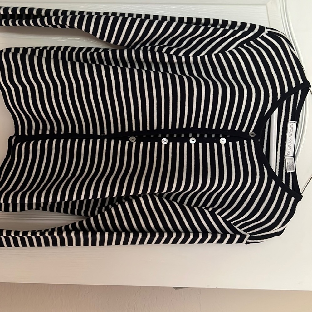 100% cotton, button up, light weight cardigan.